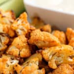 food on a plate, with Buffalo cauliflower