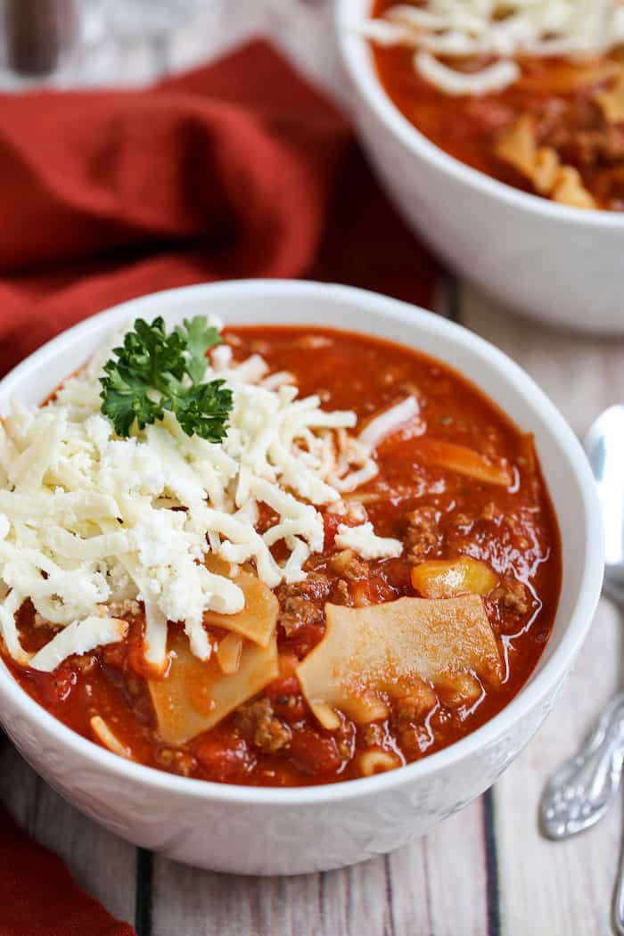 A close up of a bowl of food, with Lasagna soup