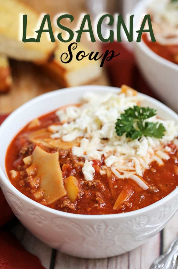 A bowl of food on a plate, with Lasagna soup