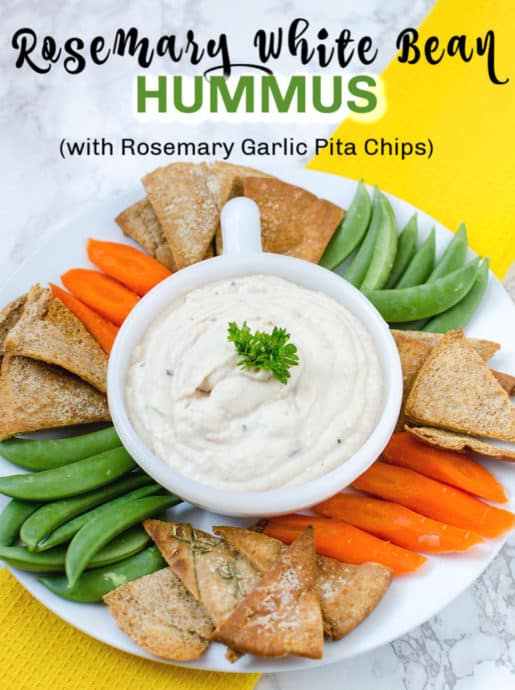 hummus dip surrounded by veggies and pita chips