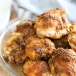 A plate full of food, with Chicken Thighs