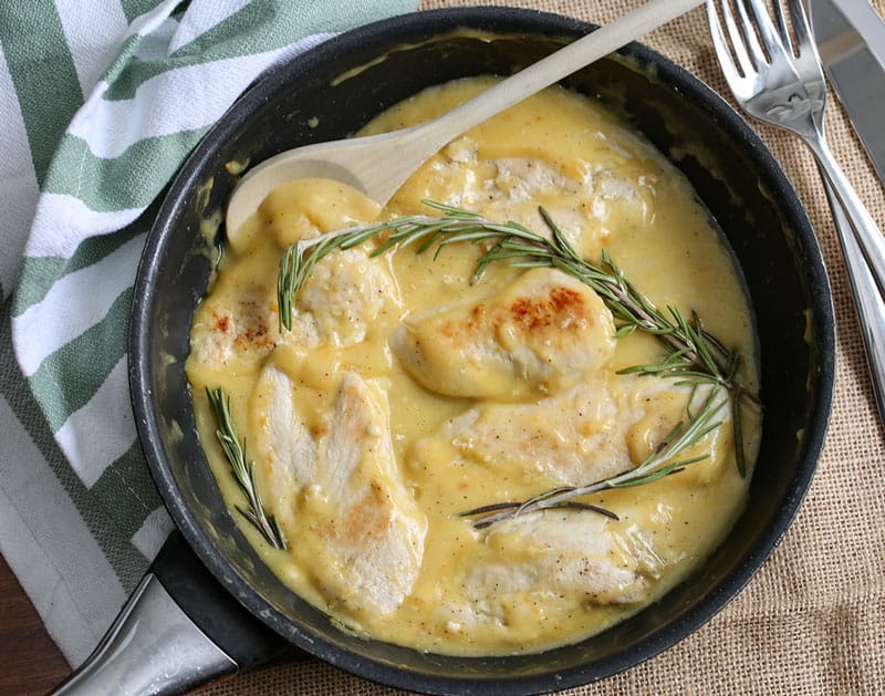 honey dijon chicken in a frying pan