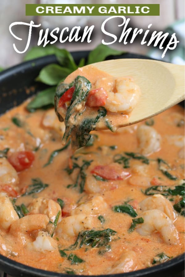 tuscan shrimp on a wooden spoon with text