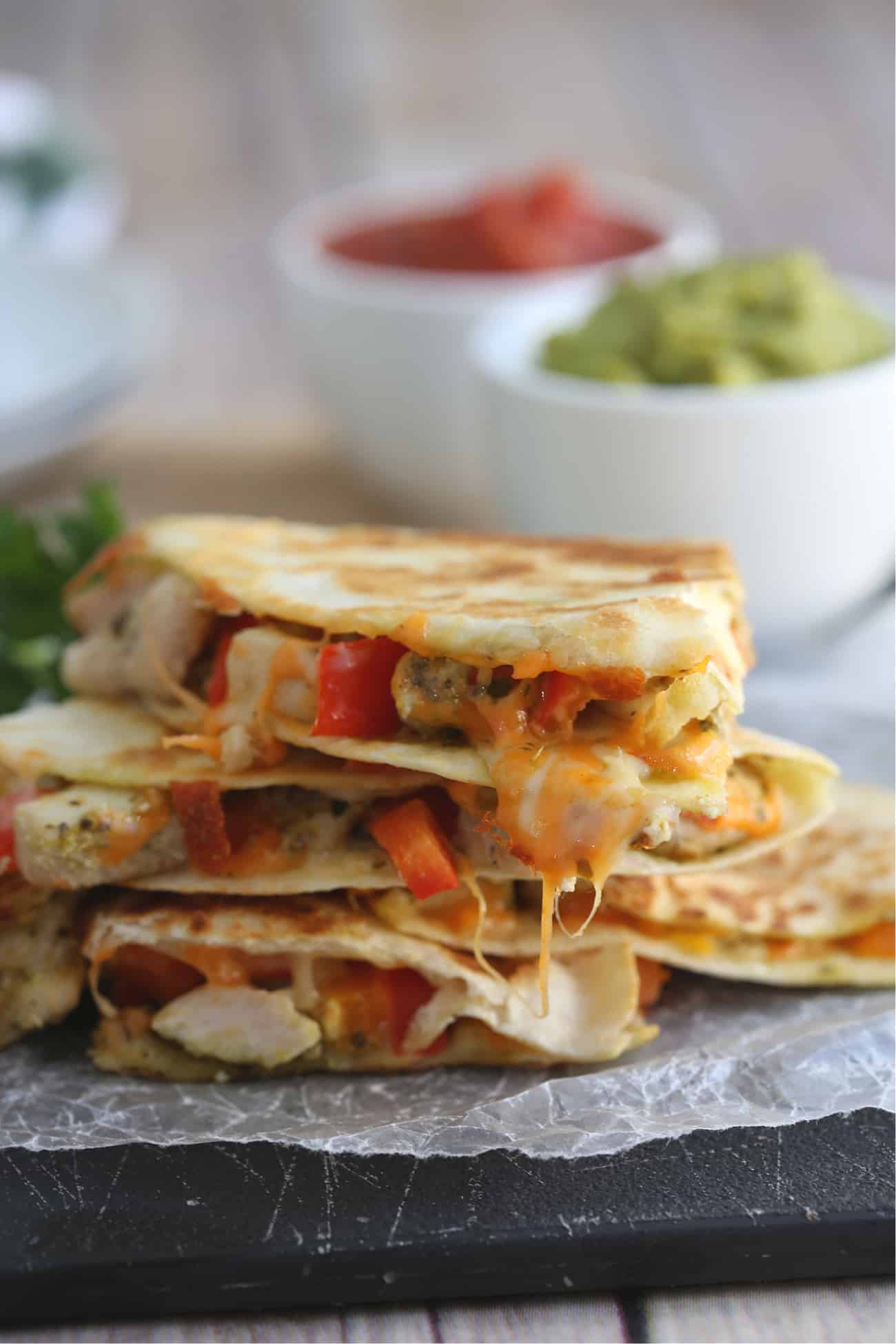 stack of chicken quesadillas on a table