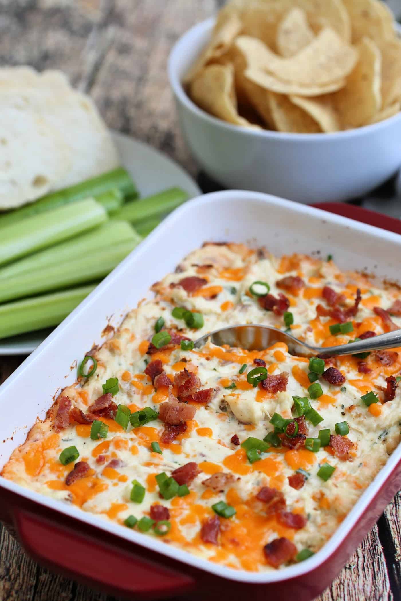 warm chicken dip in a dish on a table