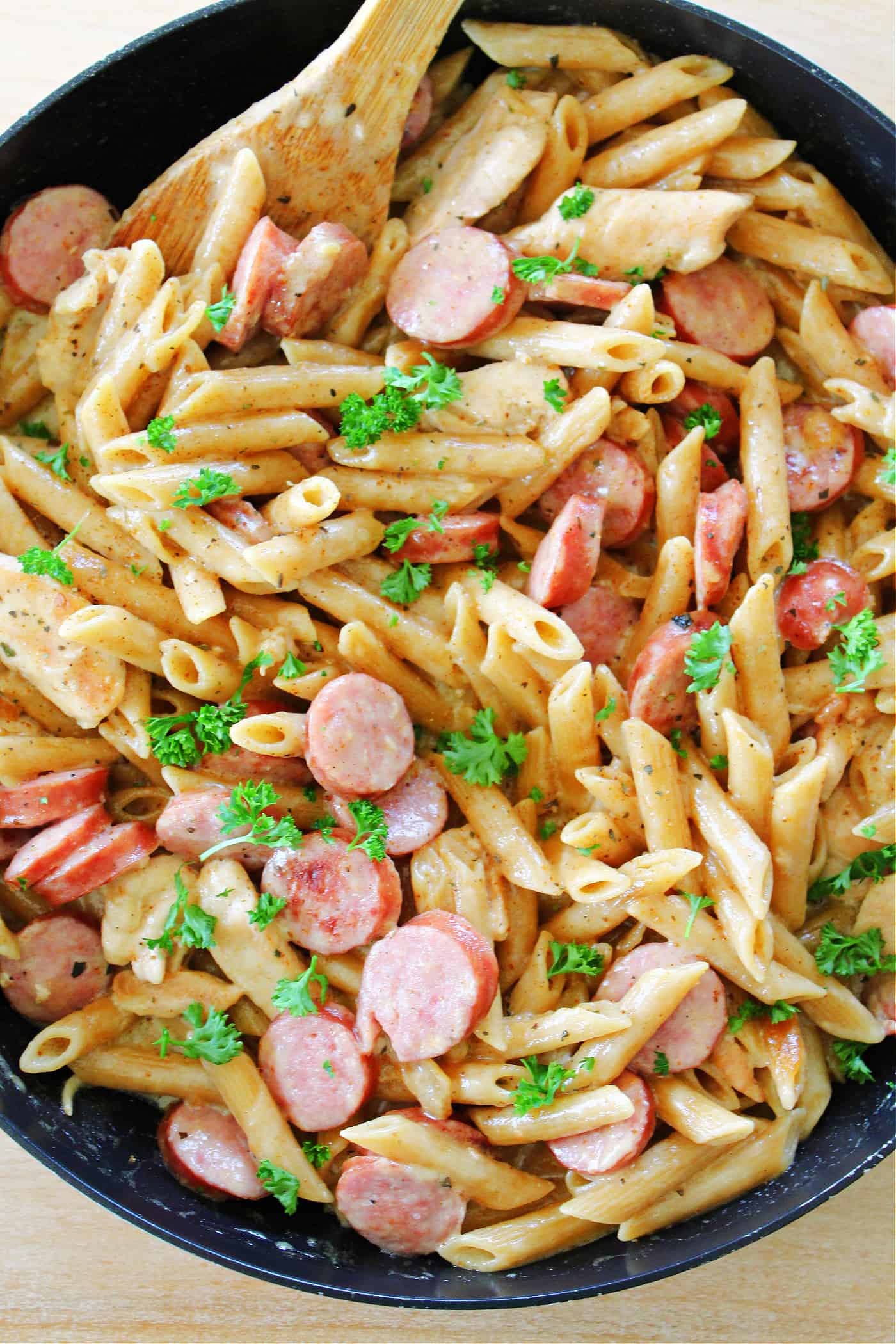 cajun chicken sausage and pasta in a skillet