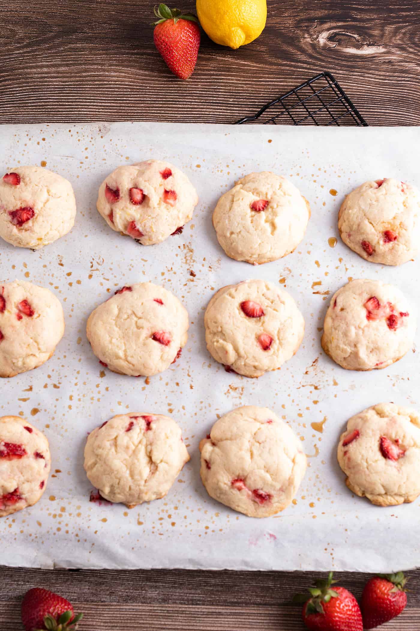 cooked strawberry lemonade cream cheese cookies on parchment paper