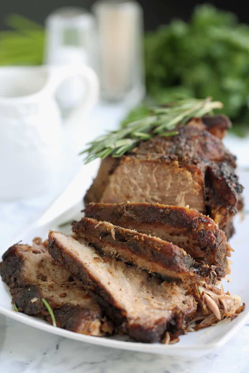 sliced roasted pork on a plate