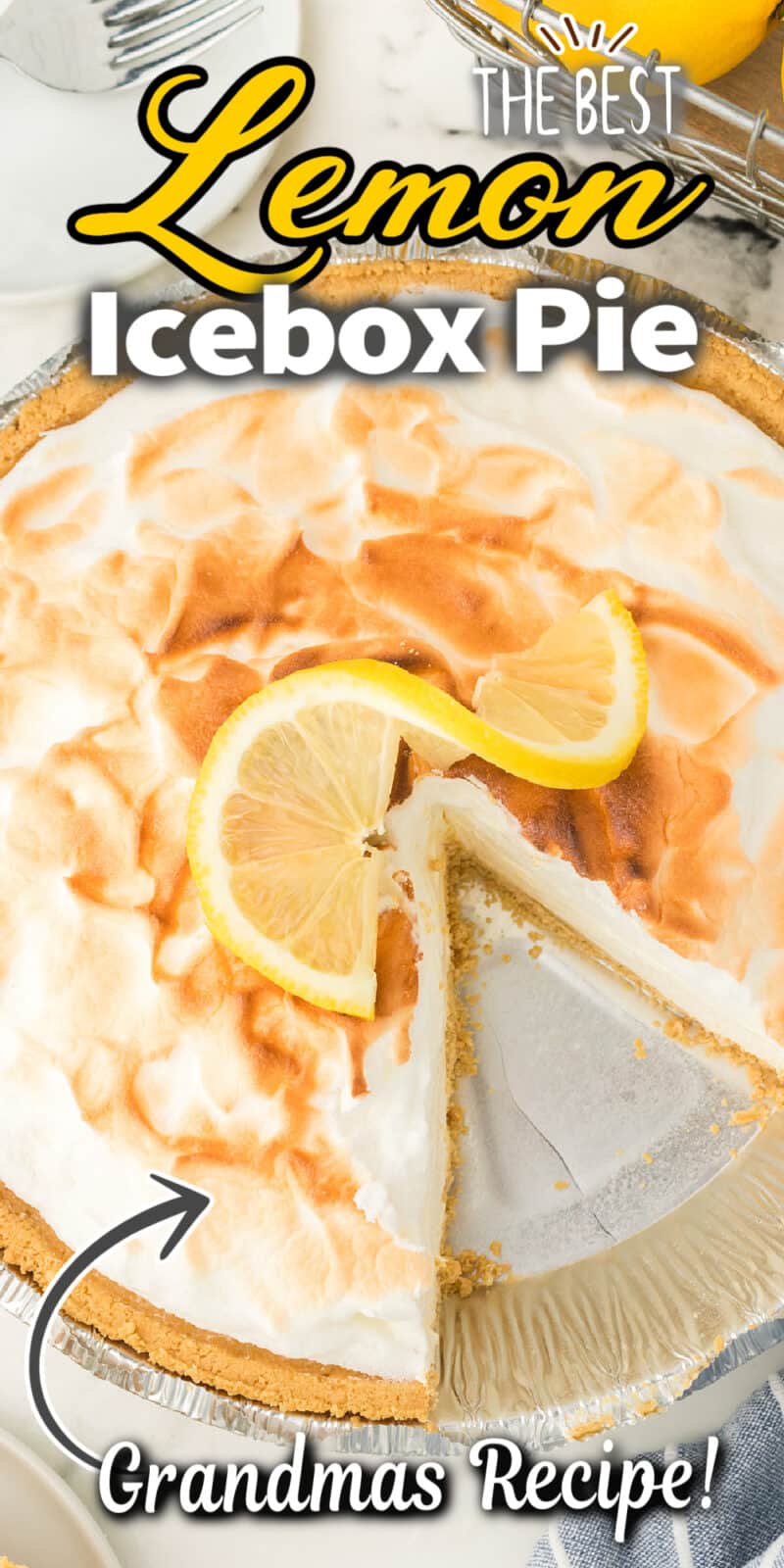 a lemon pie with a slice taken out with text