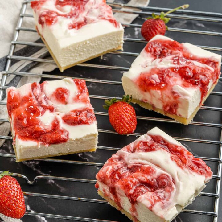 A piece of cheesecake on a plate, with Cheesecake and Strawberry