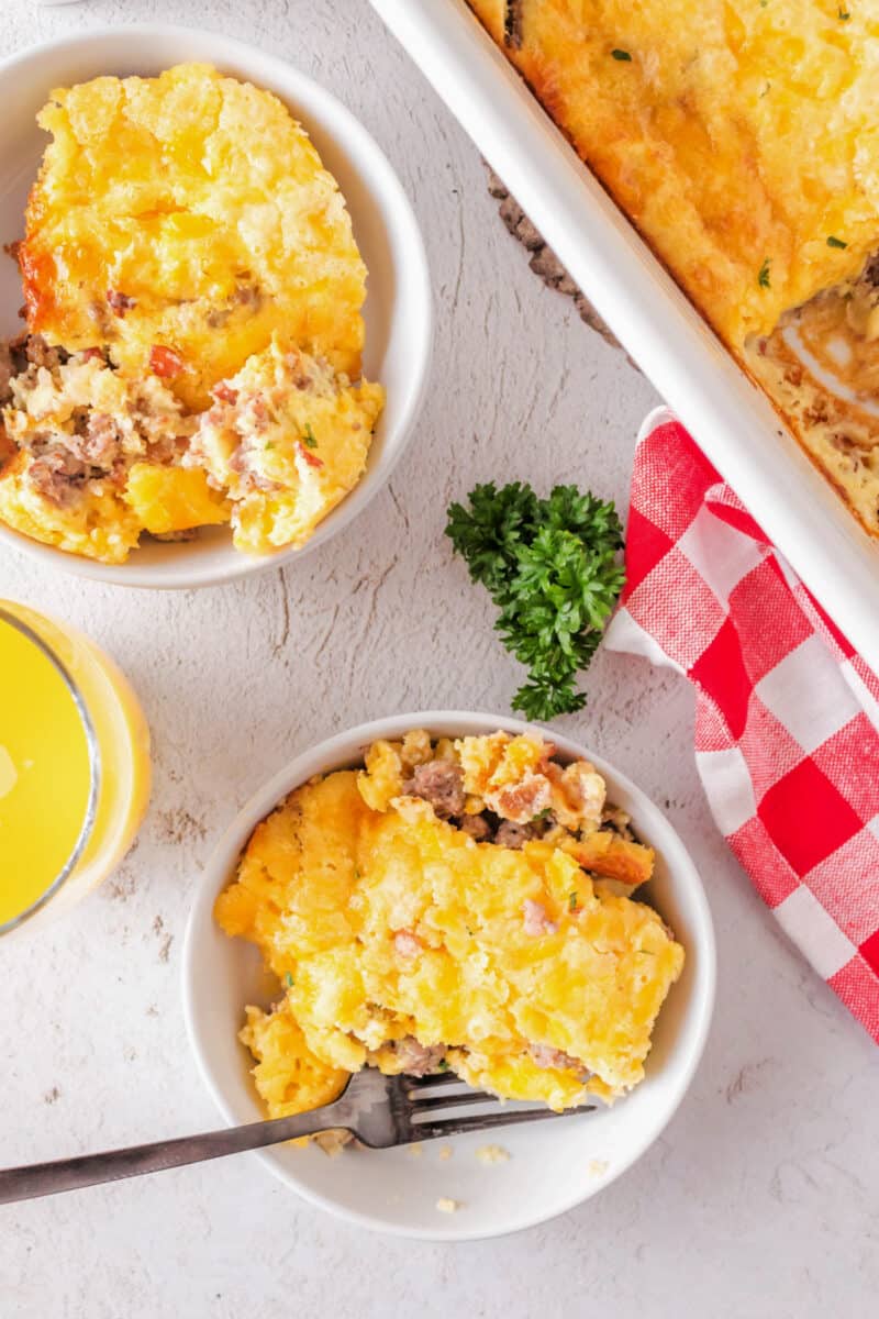 bowls with food on a table, for eggs sausage bake