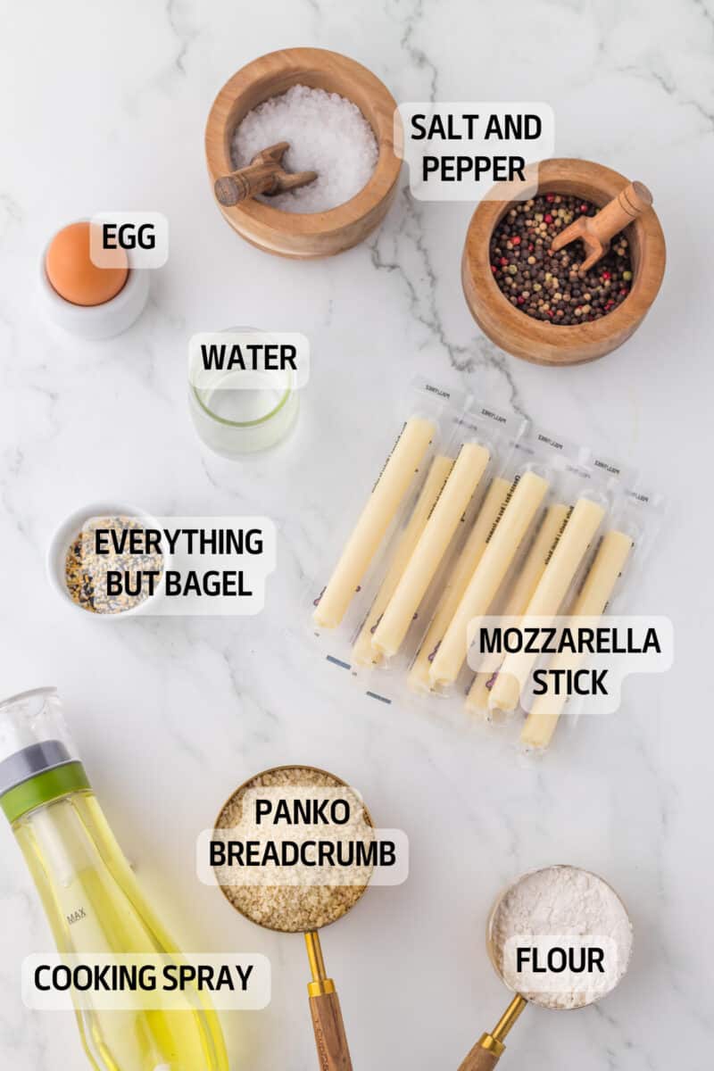 ingredients on a table, with air fryer mozzarella sticks