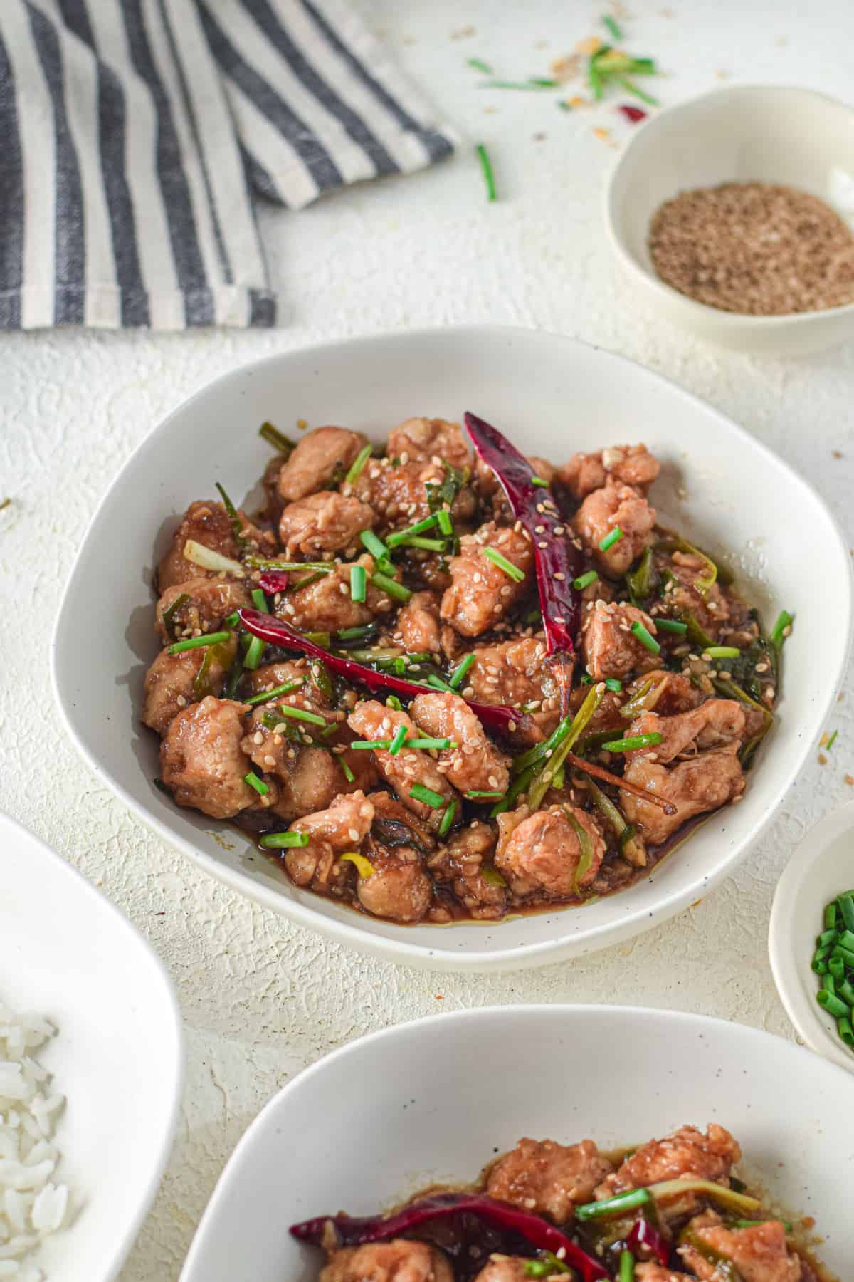 food in bowls with rice, Mongolian chicken