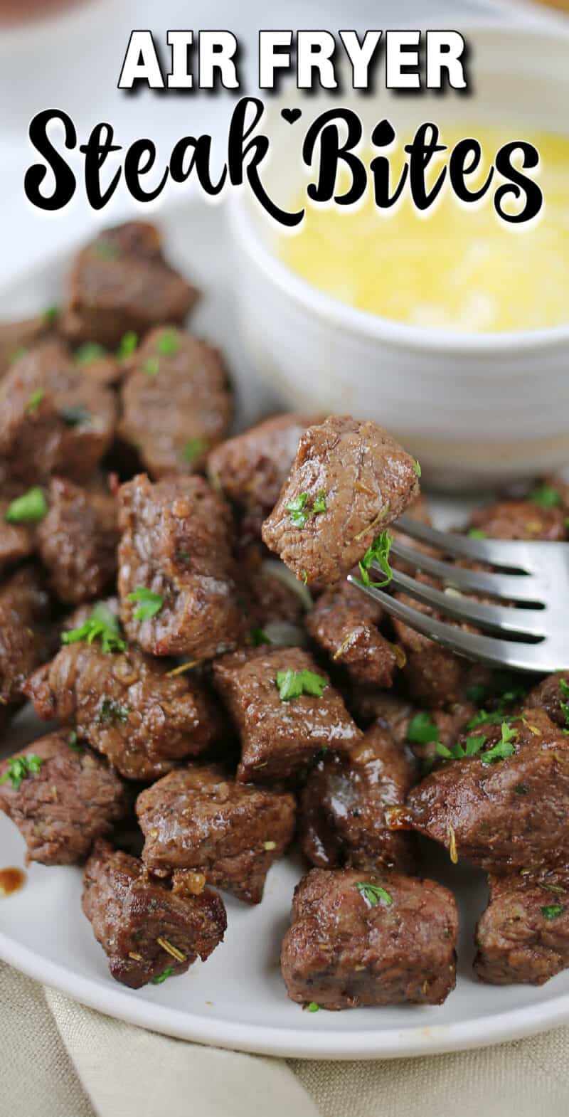 food on a fork, with Air Fryer Steak Bites