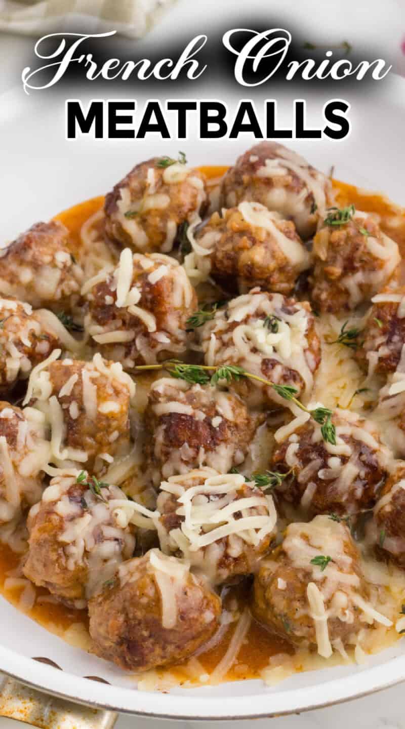 cooked meatballs in a white pan with melted cheese on top