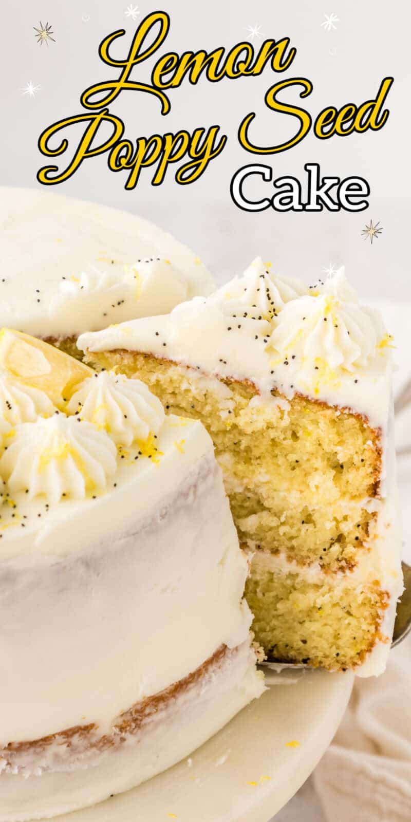 A slice of lemon poppy seed cake being cut from a whole cake.