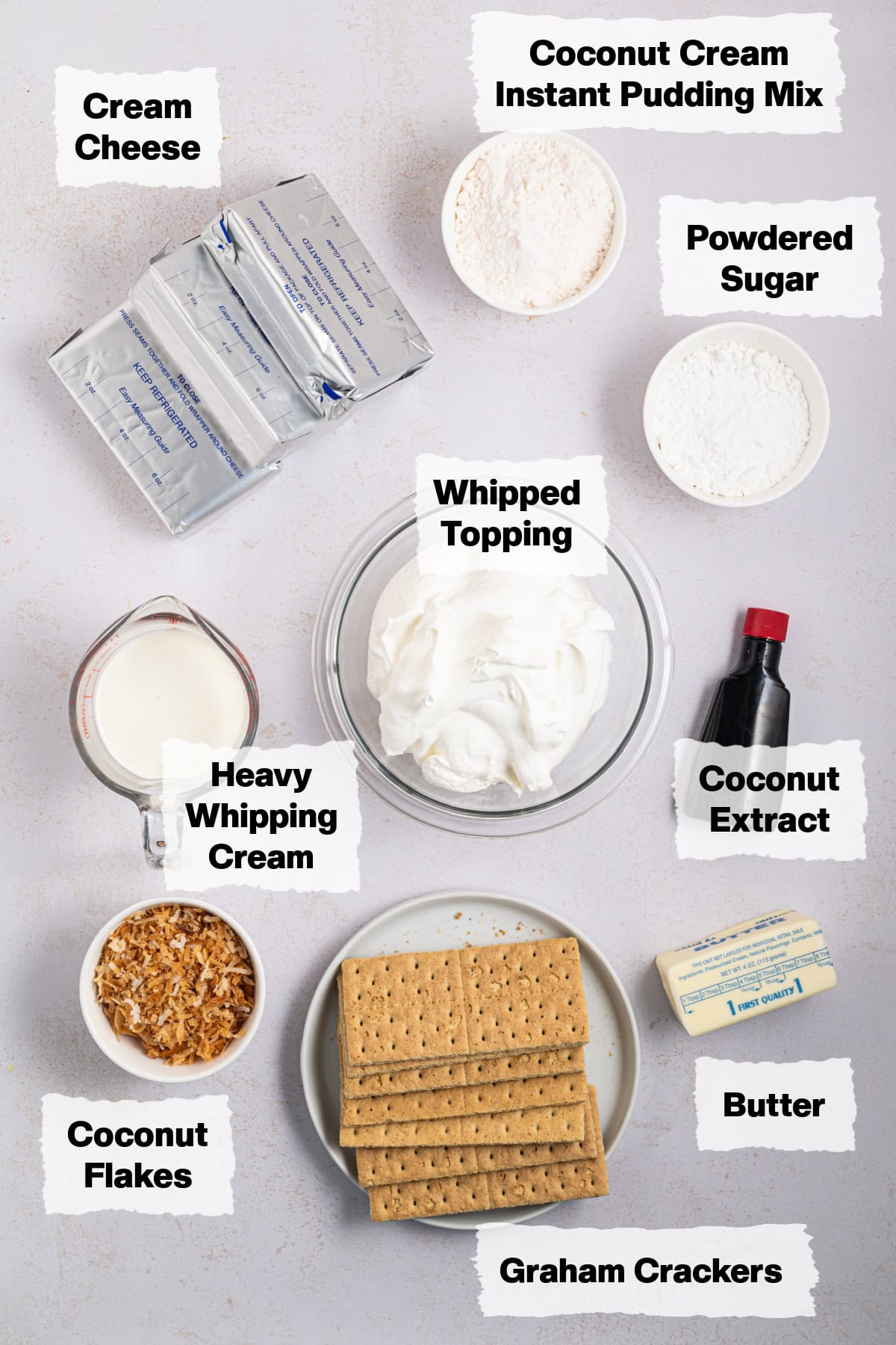 ingredients on a table to make coconut cheesecake.