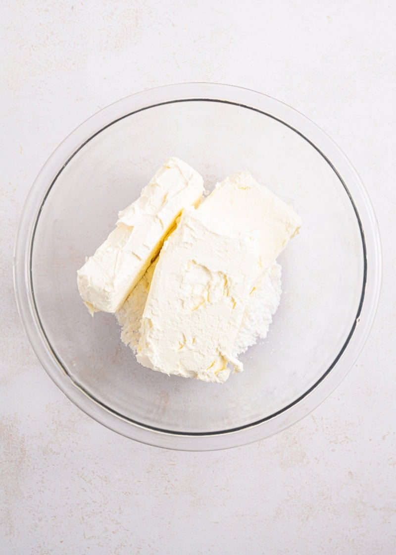 A bowl of cream cheese.