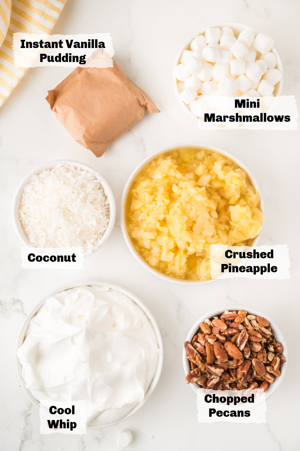 Ingredients on a table to make Pineapple Fluff salad.