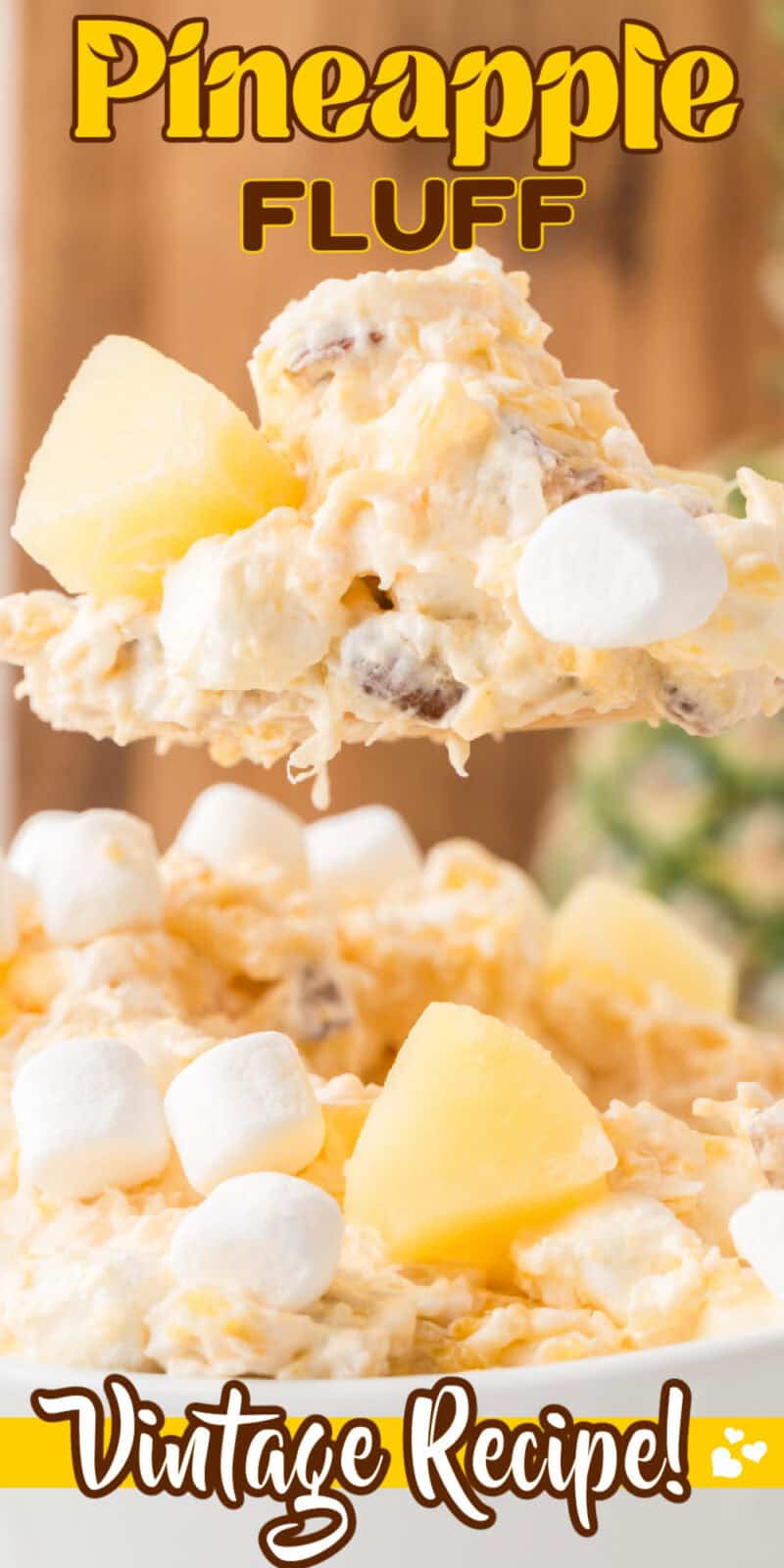 Pineapple fluff recipe on a wooden spoon.