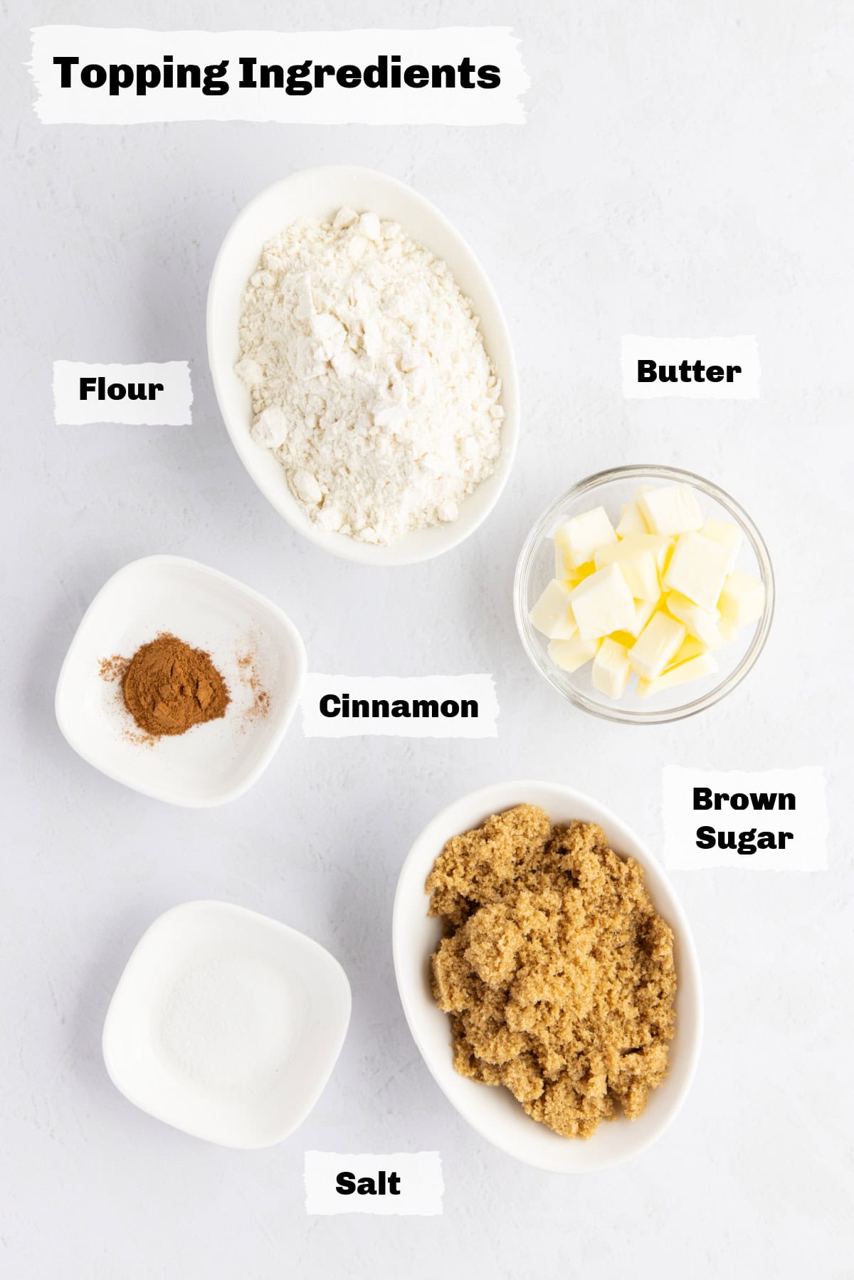ingredients on a table to make strawberry rhubarb muffins.