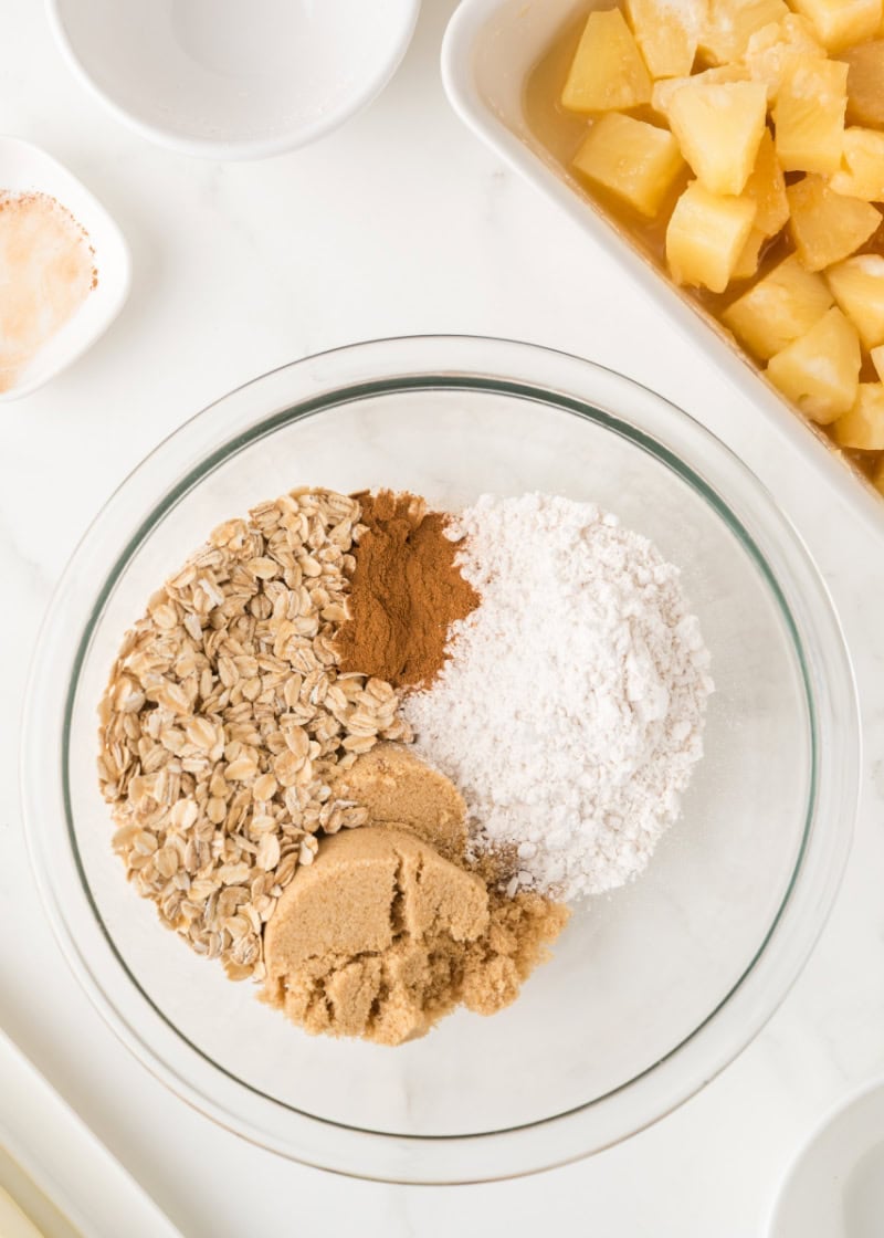 oats, brown sugar and flour in a glass bowl.