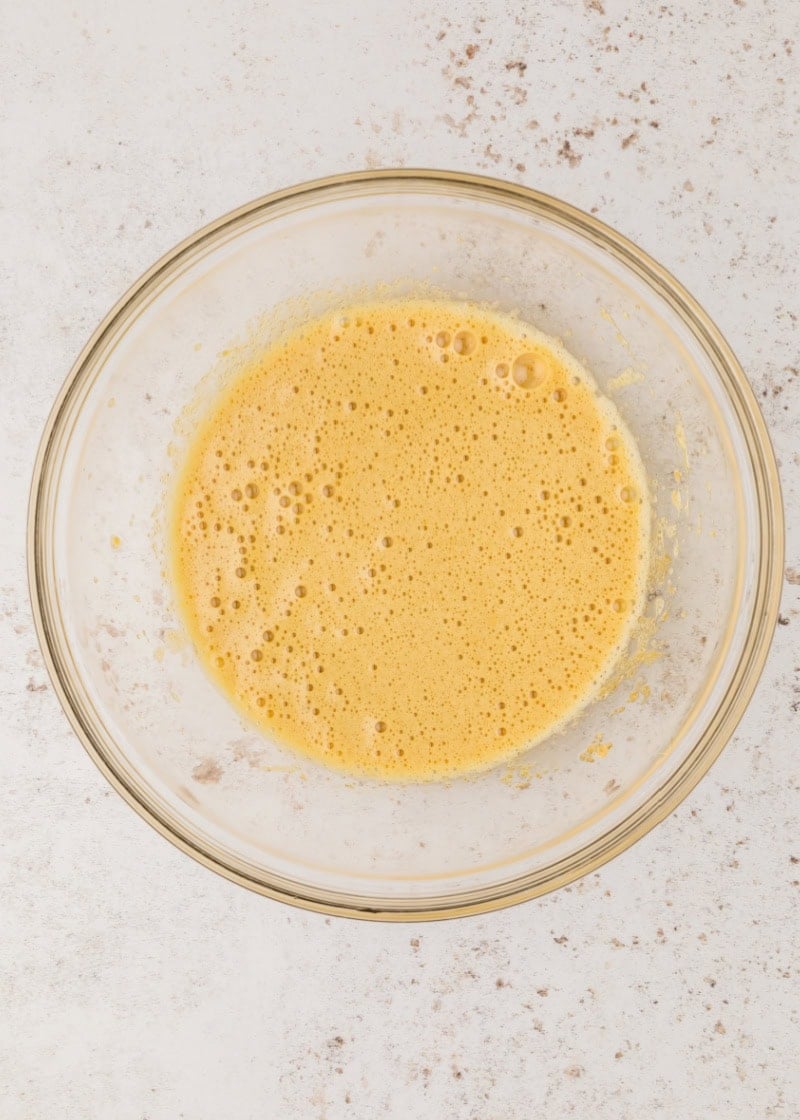 A bowl of liquid in a glass bowl.