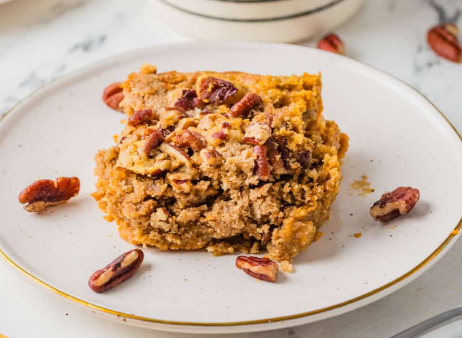 A piece of pumpkin dump cake on a plate.