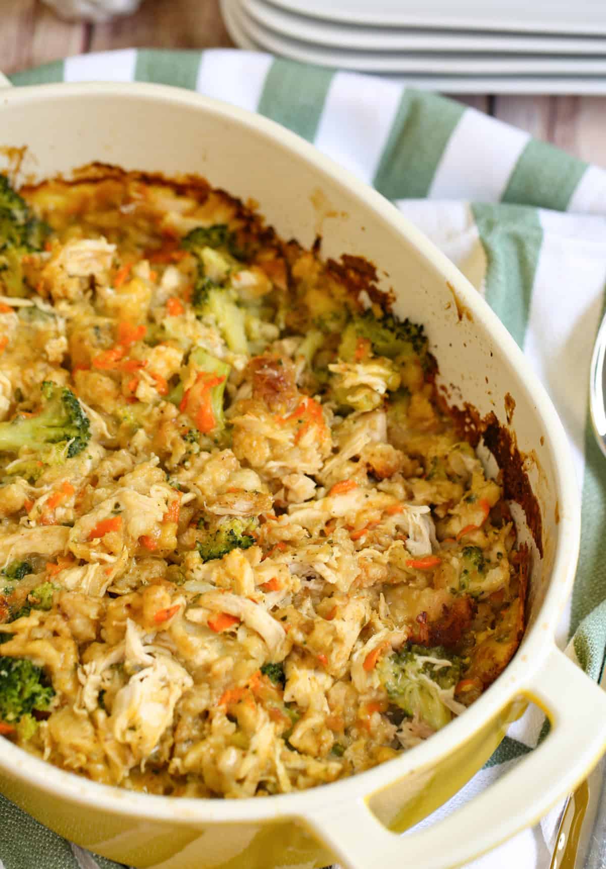Chicken and Stuffing Casserole on a table with plates.