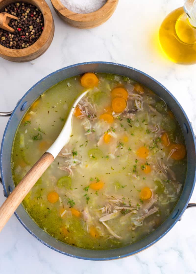 Turkey and Rice Soup cooking in a large pot.