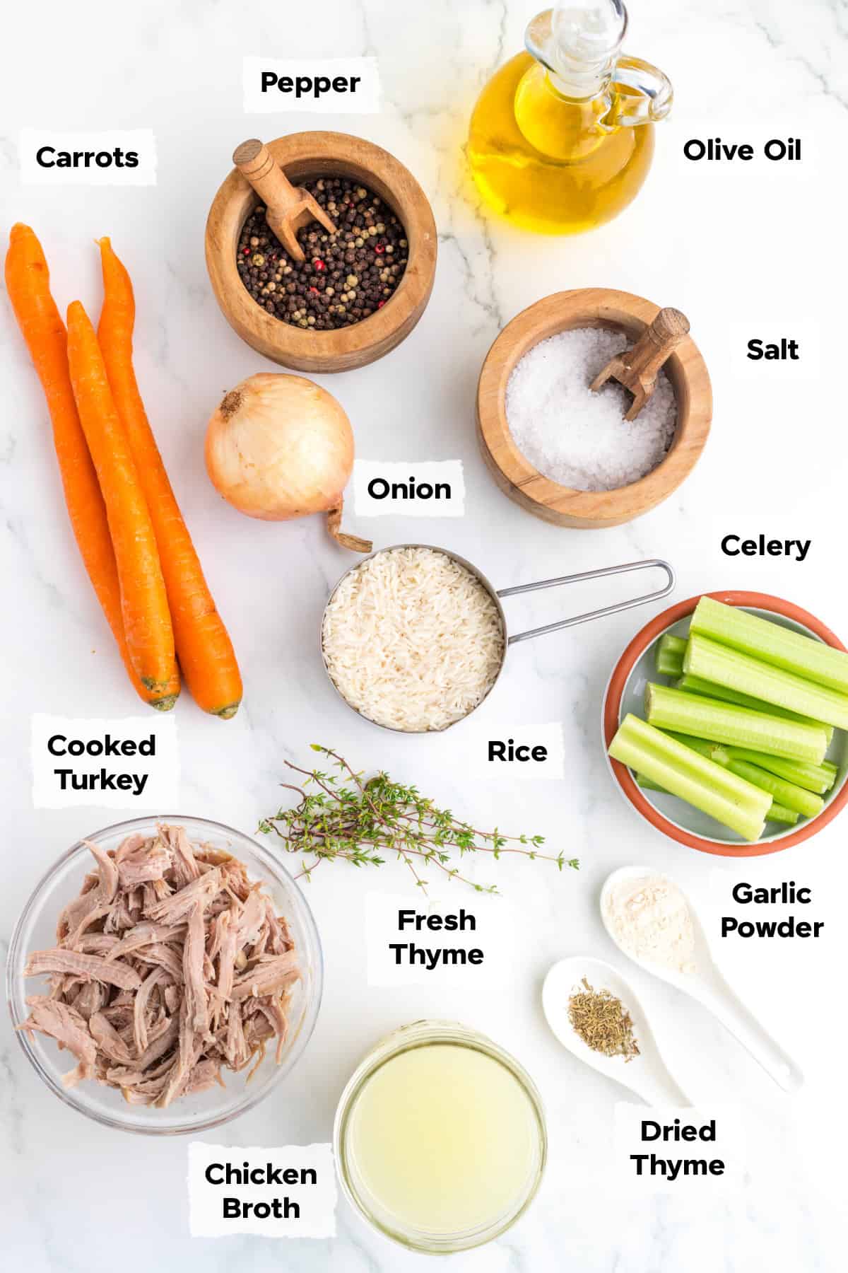 Ingredients on a table to make Turkey and Rice Soup.