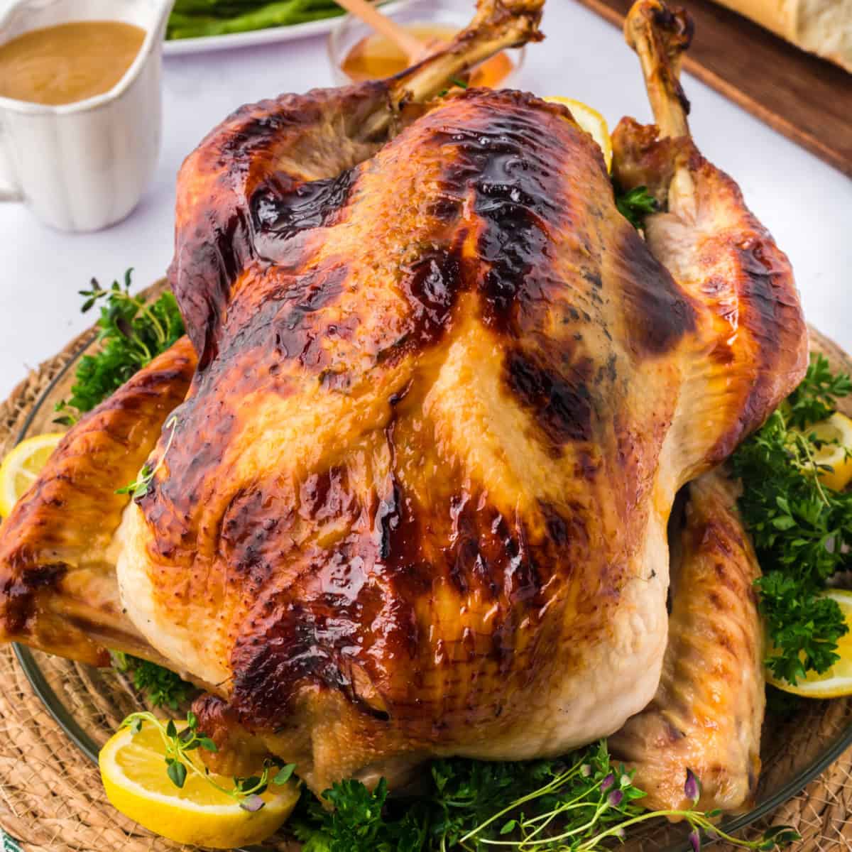 whole honey baked turkey on a table.