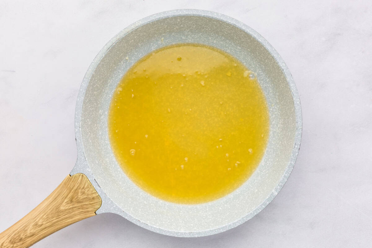 honey glaze in a pan for cooked turkey.