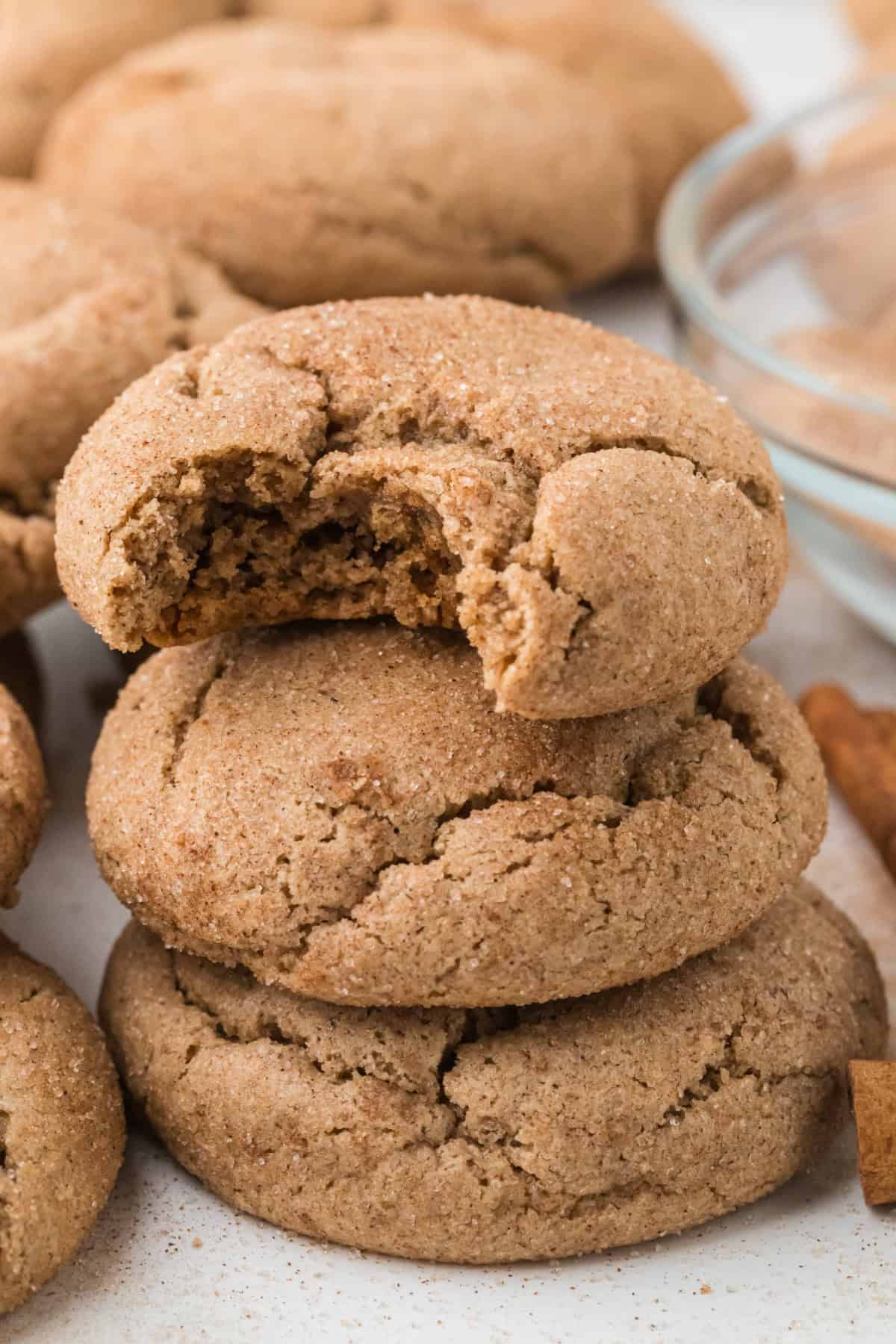 Spice Cake Cookies in a pile with a bite taken out of the top one.