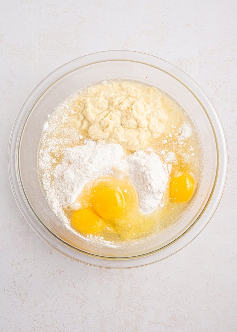 ingredients in a baking dish to make eggnog poke cake.