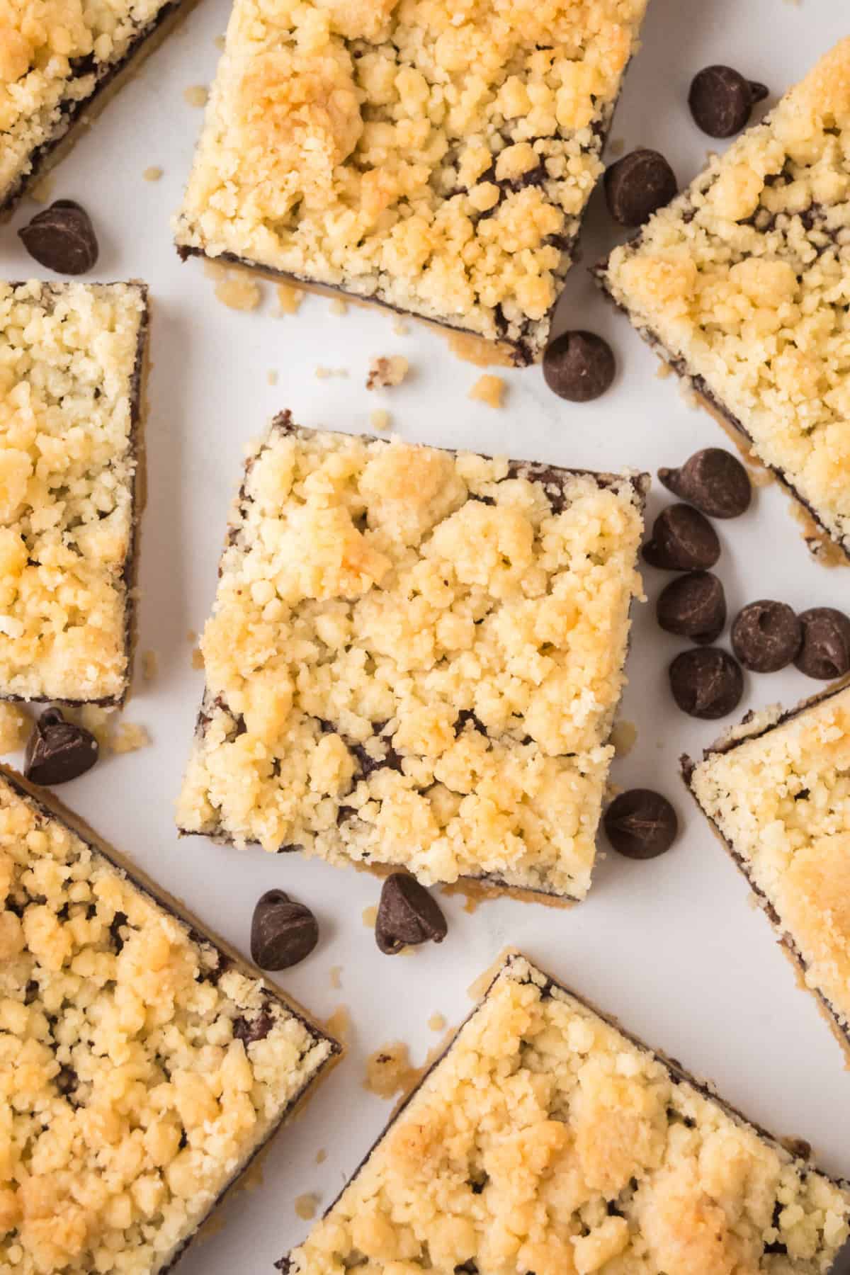 Chocolate Shortbread Bars on a table with chocolate chips.