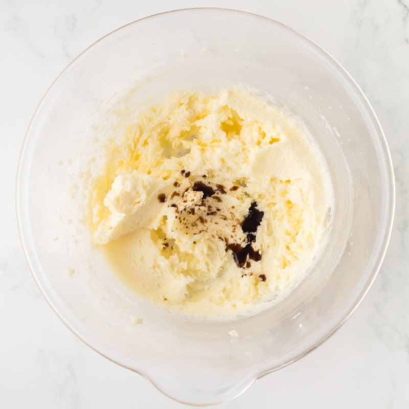 butter, granulated sugar and vanilla extract in a glass mixing bowl.