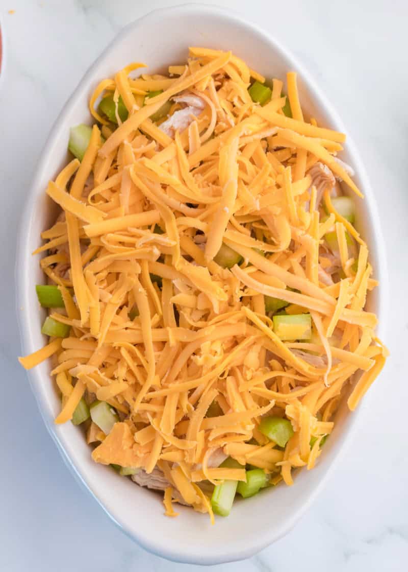 Unbaked yet prepared Cottage Cheese Buffalo Chicken Dip on a table.