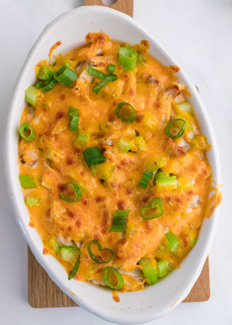 Baked Cottage Cheese Buffalo Chicken Dip in a dish on a table.