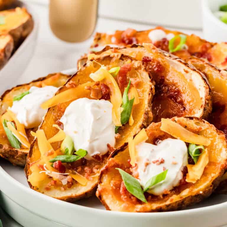 Air Fryer Potato Skins on a white plate.