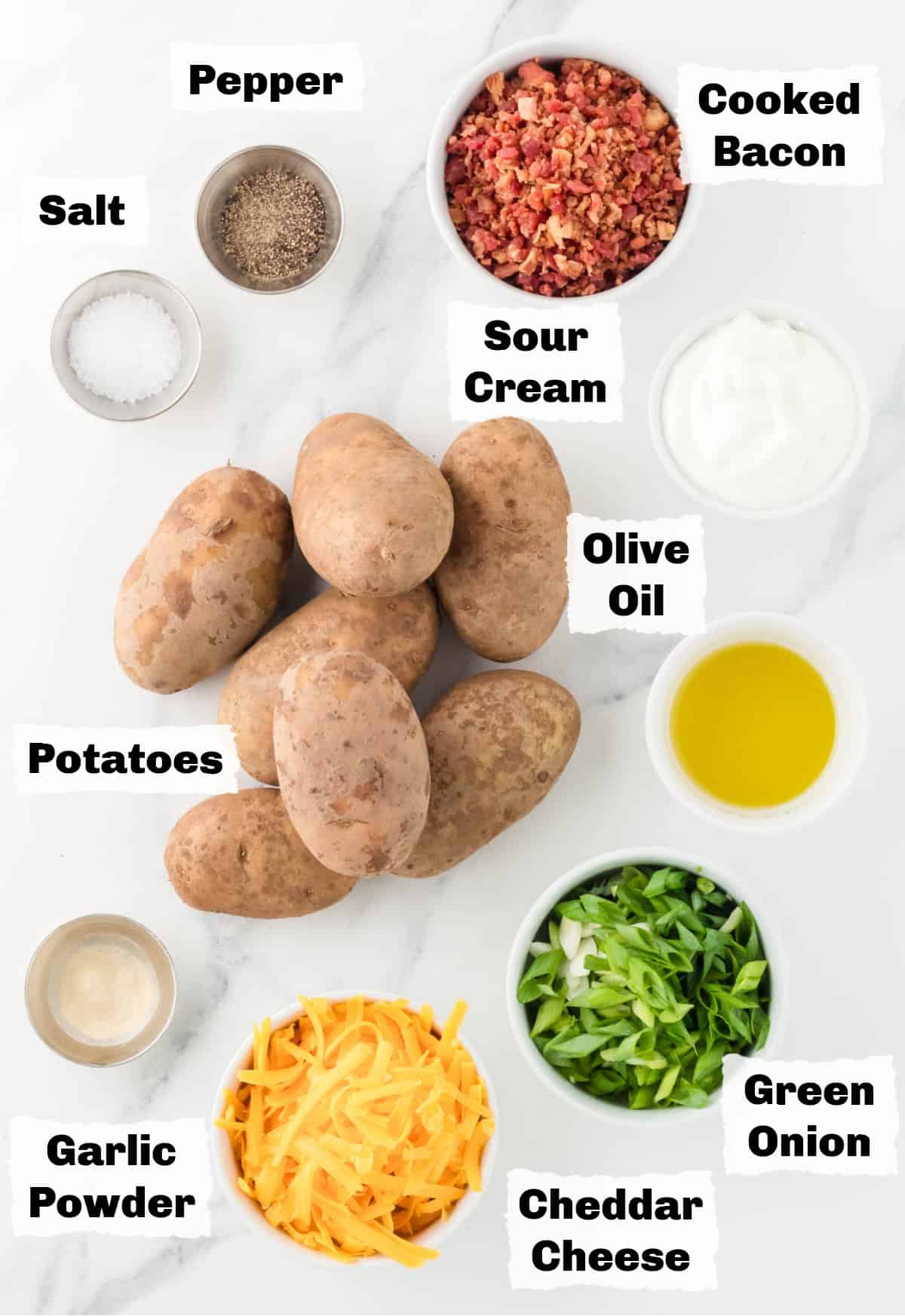 Ingredients on a table to make air fryer potato skins.