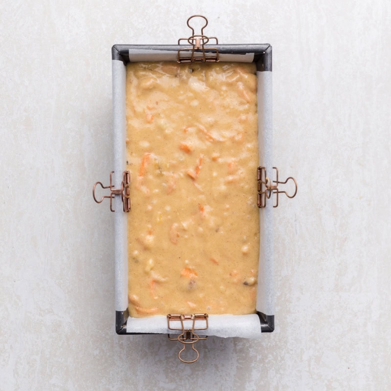 Unbaked Carrot Cake Banana Bread in a loaf pan.