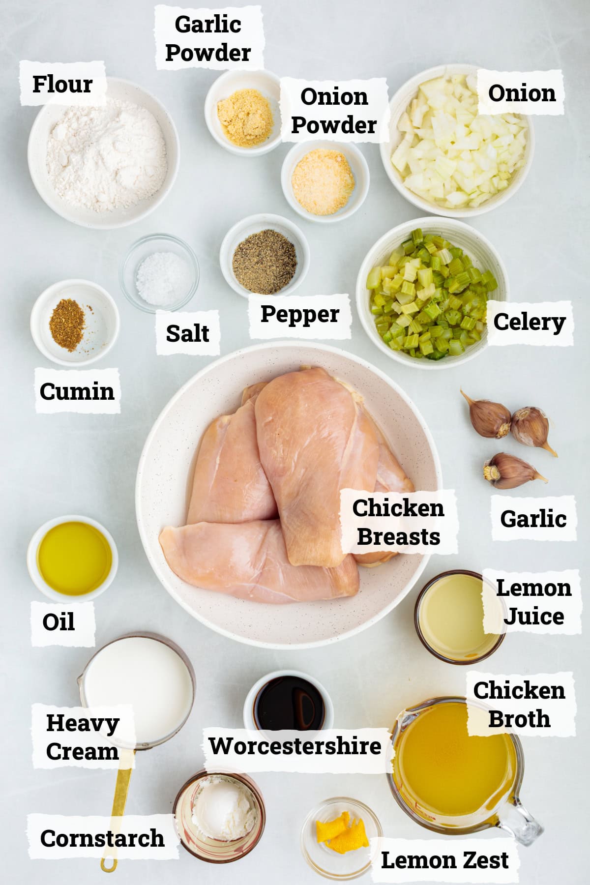 ingredients on a table to make smothered chicken.