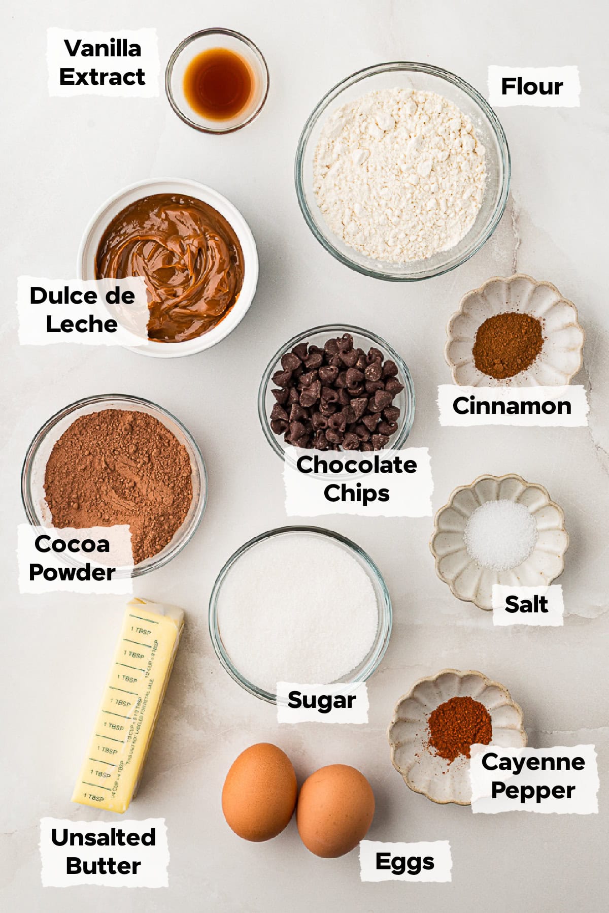 Ingredients on a table to make Mexican brownies swirled with dulce de leche.