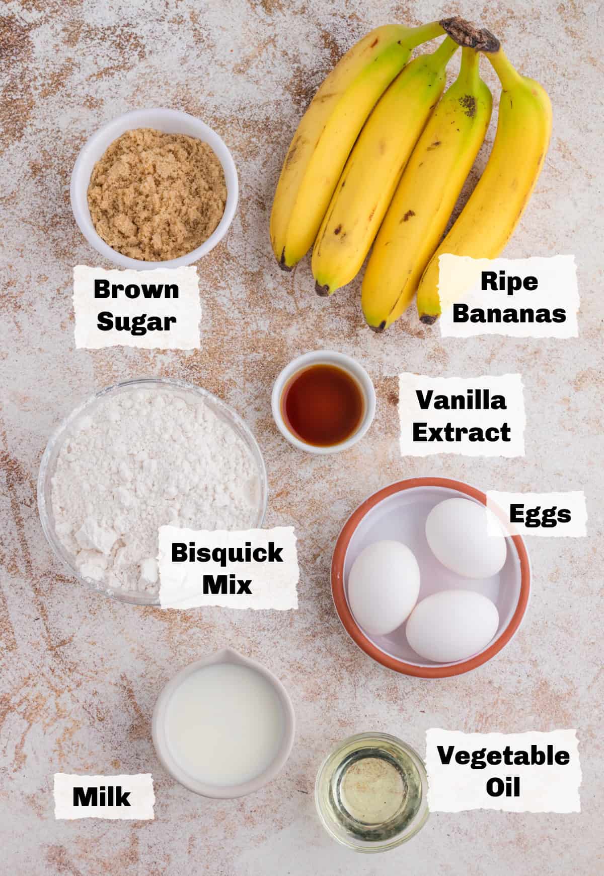 Ingredients on a table to make Bisquick Banana Bread.