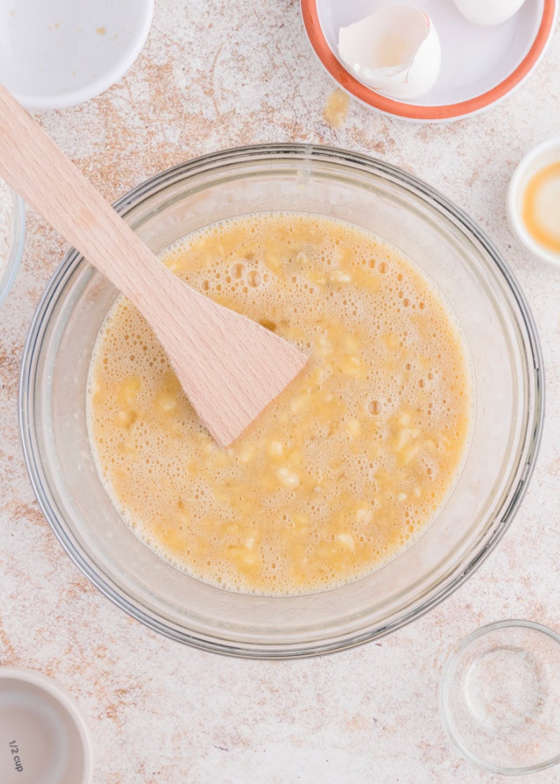 A bread mixture in a glass bowl.