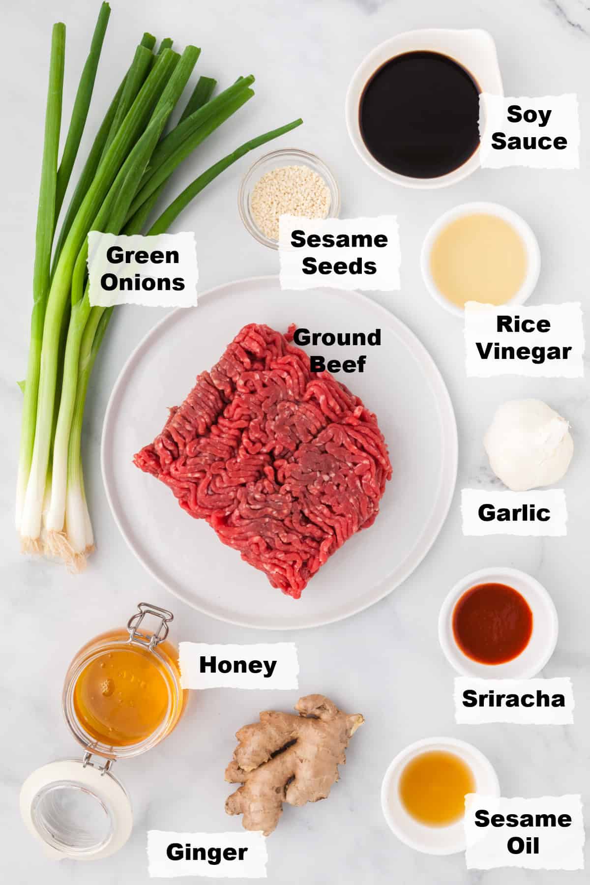 Ingredients on a table to make Korean beef with ground beef.