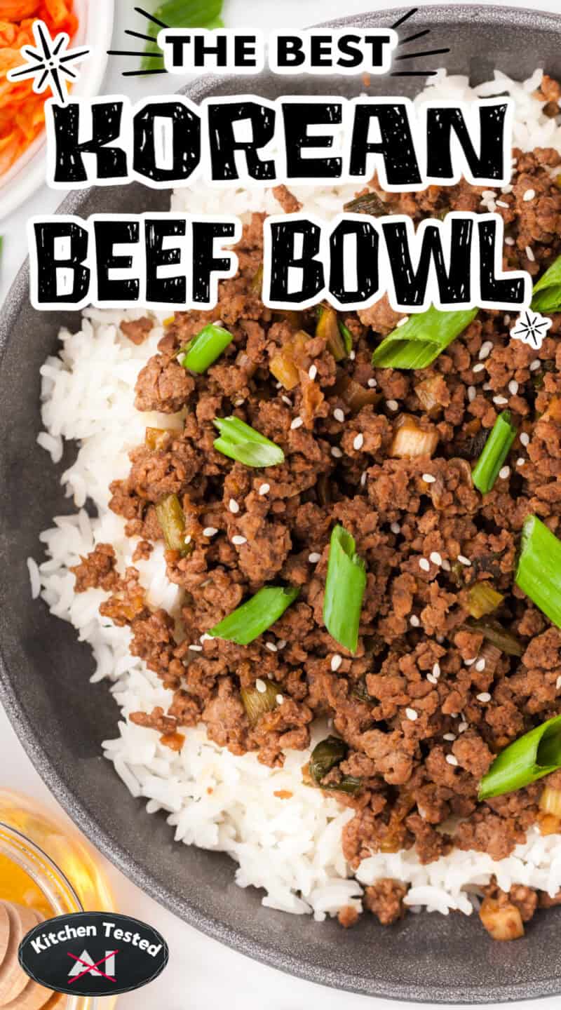 Korean ground beef in a bowl over rice and topped with green onions.
