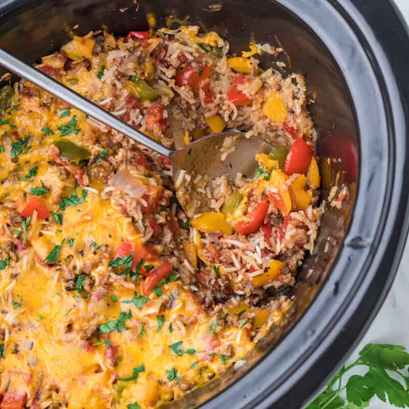 Cooked Slow Cooker Stuffed Pepper Casserole in a crockpot dish.