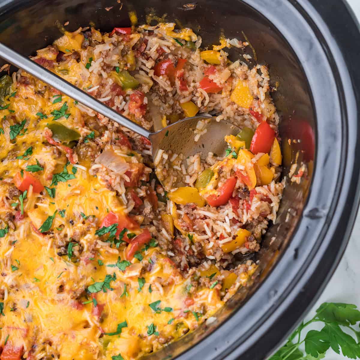 Cooked Slow Cooker Stuffed Pepper Casserole in a crockpot dish.